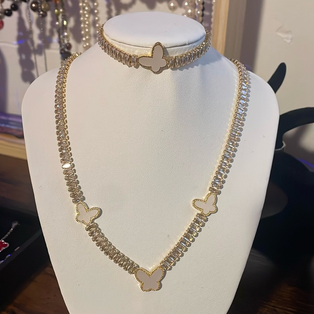 Gold butterfly, crystal necklace, and bracelet set ￼